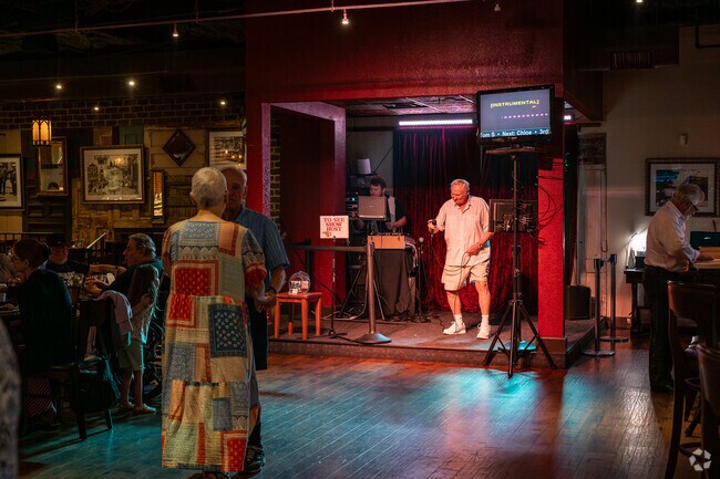 Theres always something going on, such as community karaoke, near the Village of Tall Trees.