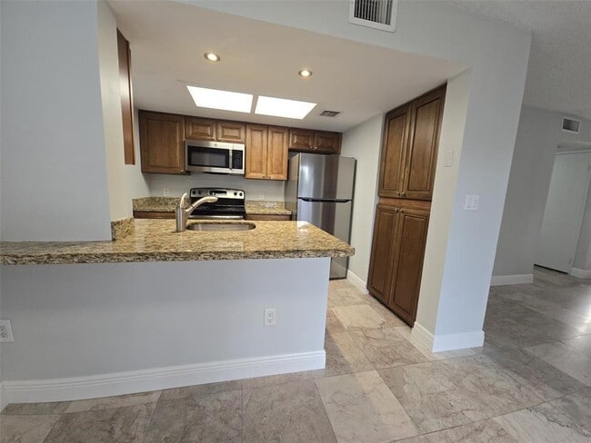 8414 Coral Lake Way, Coral Springs, FL 33065 - photo 2