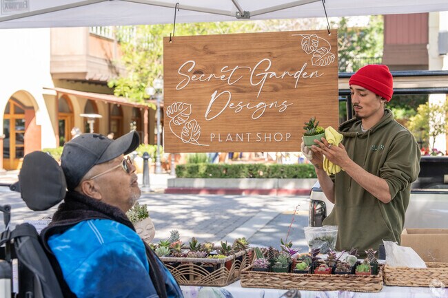 Various vendors bring community together at Todos Santos Plaza during the farmer's market.