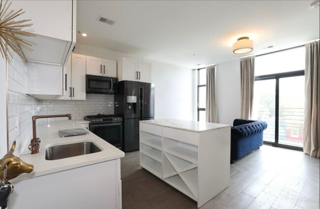 Main living room and kitchen area