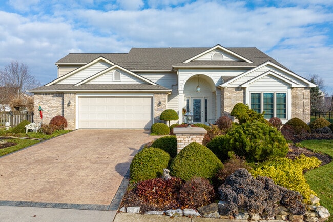 This home, like most in Southwest Fort Wayne, has a beautiful professionally landscaped yard.