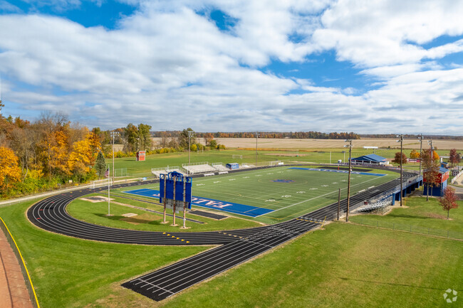 Clinton_Massie High School in Harlan Township features a football field.