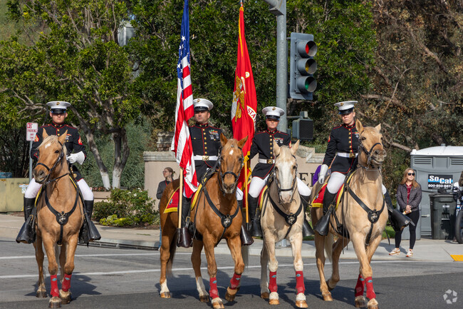 This patriotic equestrian color gaurd rides to honor the citizens of Niguel Summit.