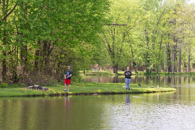 Two young men patiently wait for the fish to bite at Dobbs Park in Terre Haute, IN.