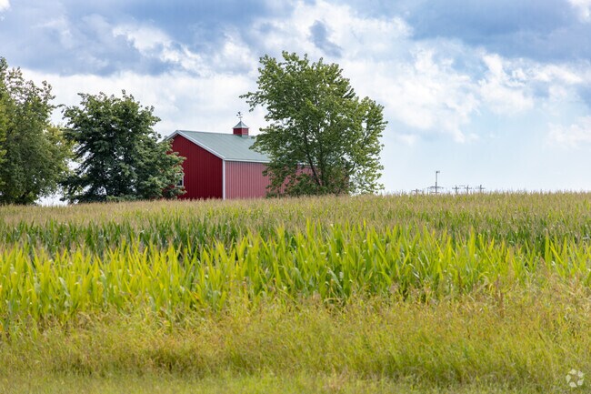 Raymond’s farmland includes barns, crops and homes on parcels ranging from 5 to 10 acres.