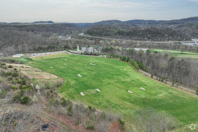 The golfcourse at Coonskin Park is maintained with lush greens and long driving ranges.