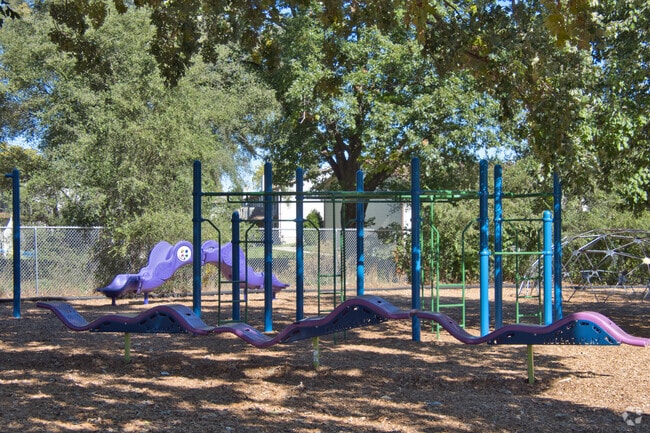 Playground play area shows more of the monkey bars at Grandville East Elementary School.