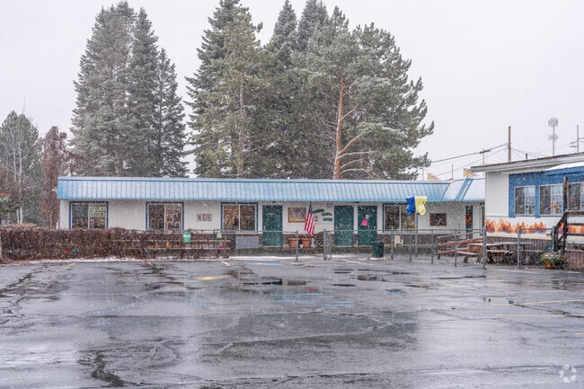 Pioneer School features a small parking lot in front of the school for visitors andstaff.