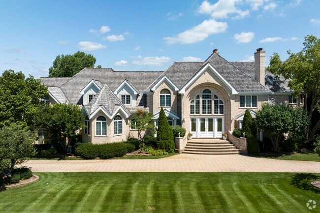 Manicured lawns and stately homes line the streets of South Barrington.