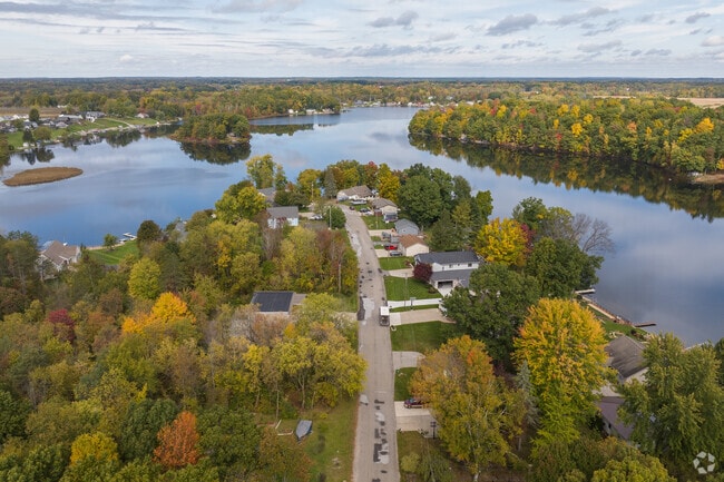 Newer homes line the shores of Big Pine Island Lake in Grattan Township.