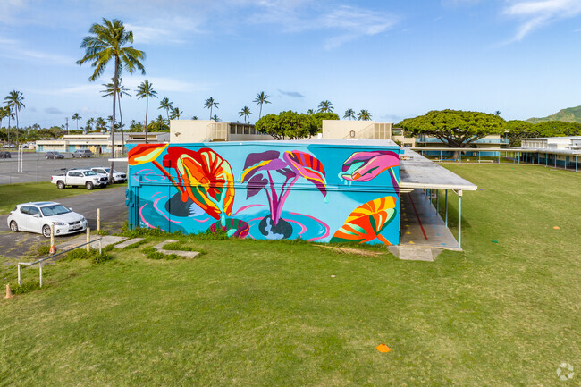 Kailua Intermediate School's exterior wall displays a bright and creative mural.
