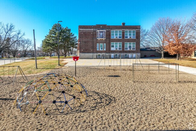 A classic jungle gym and other playground equipment makes for fun recess time.