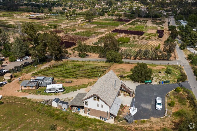 Large Farms with Fields of Produce are mixed in Jesmond Dene Escondido.