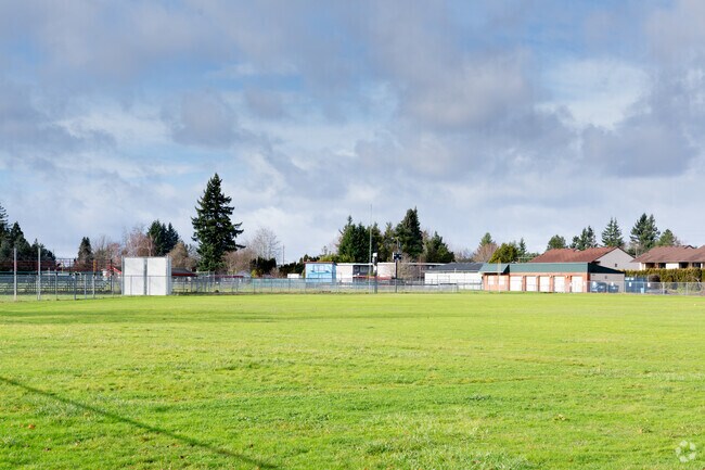 A large sports field sits behind Lynch Meadows Elementary School.