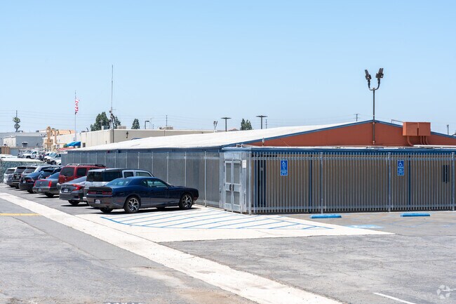 Parking lot view of Orange Grove High School in the city of Corona.
