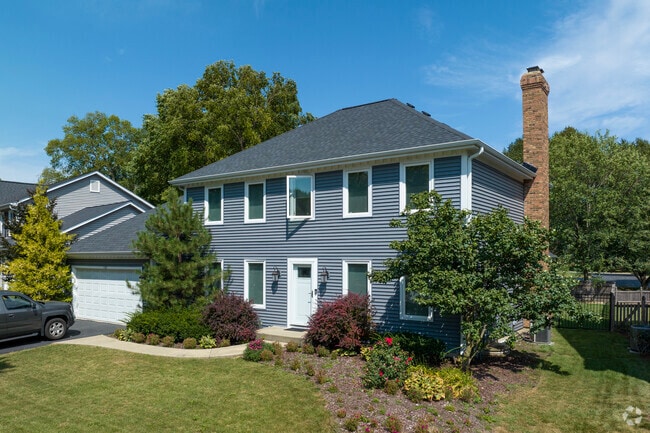 Brookdale homes come complete with manicured lawns and brick chimneys.