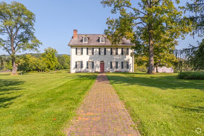 Historic mansions at Curtin Village in Boggs, sit as a reminder of old charcoal country.
