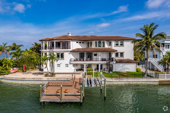 Spanish Revival Homes are found in the gated community in Gulfport Neighborhood and many of them sit on the waters edge.
