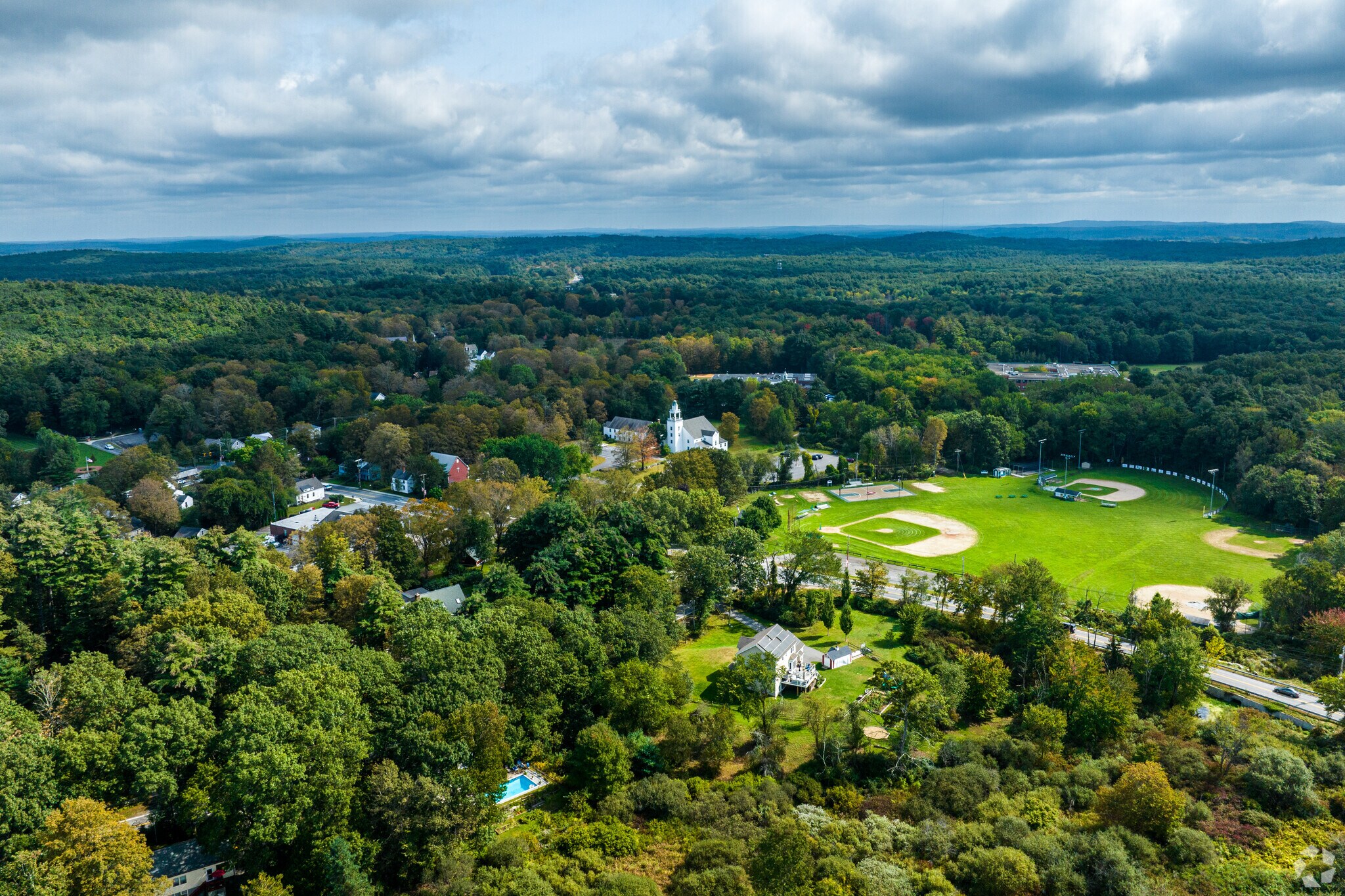 An aerial overview of the Bolton, MA and its Memorial Sports Fields.