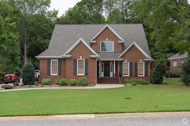 Grove Hill sits alongside Moore’s Mill Club, offering some residents fairway views.