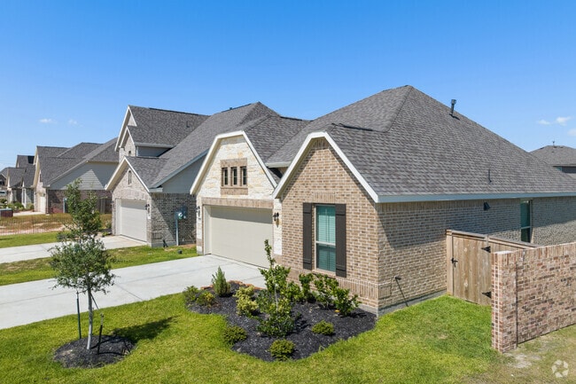 A modern home with a garden adds charm to Holiday Lakes.