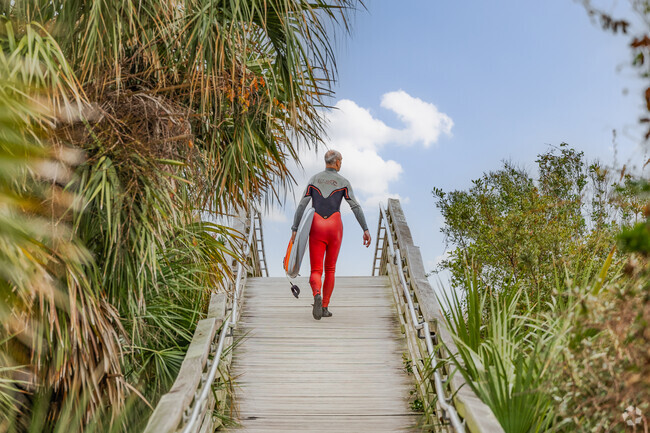 Surfers flock to Isle of Palms for quiet beaches and great waves in Charleston.