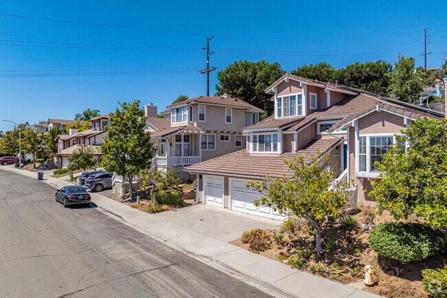 Two-story Mediterranean style homes are found in new developments along the hillside of Midway.