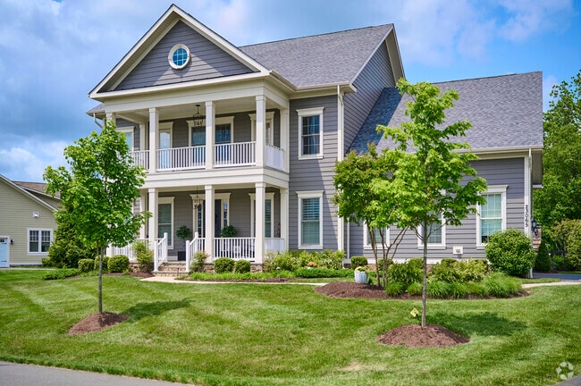 Stately Craftsmen homes in Willowsford feature spacious layouts and inviting curb appeal.