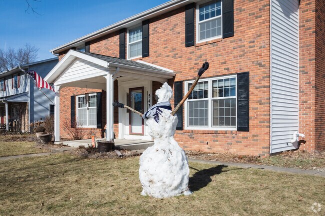 This Glenwood Park snowman counts down the days until spring.