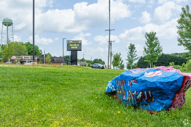 Students help decorate the school boulder each year at Banoak Elementary School.