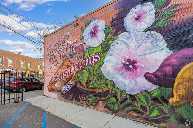 Beautiful artwork covers the walls at Sweet Potato Sensations.