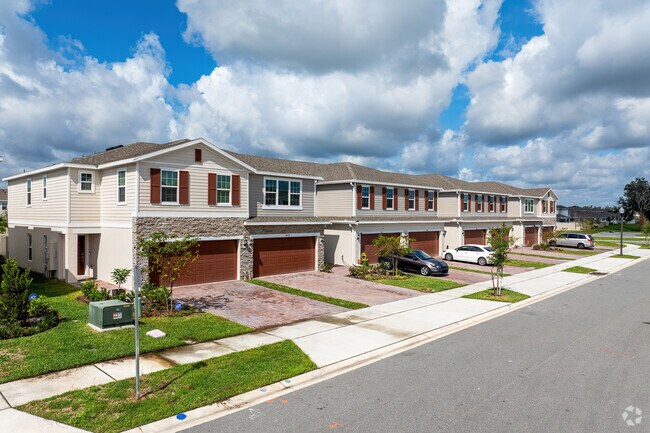 A row of newly constructed townhomes showcases appealing colors to Campbell City buyers.