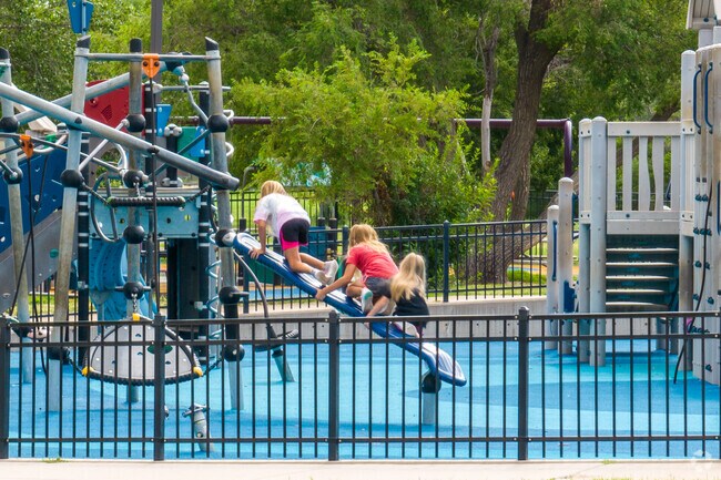 Kids in West Wichita can climb on the playground at Sedgwick County Park.
