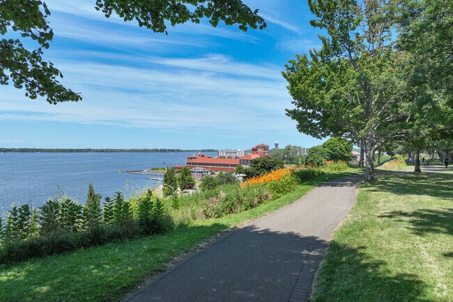Bayview Park’s walking path winds past courts and a splash pad near the bayfront.
