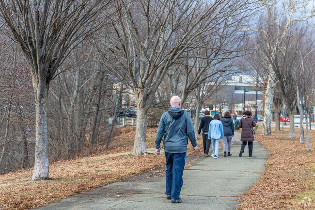 Enjoy a walk along the Charles River Greenway in Watertown Square.