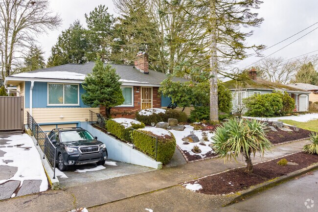 A beautiful ranch home with a recessed garage.