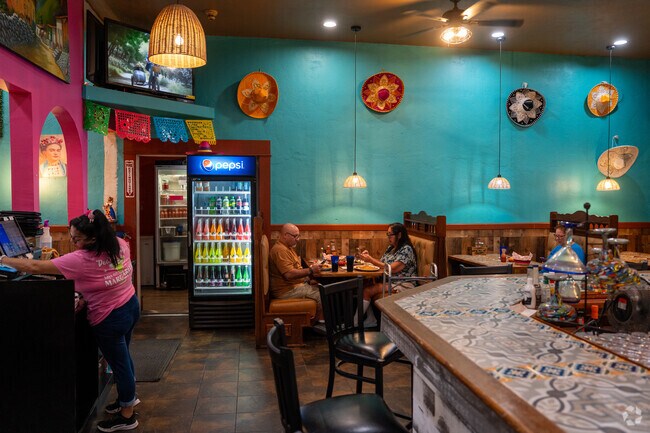 Fiesta Bamba has a colorful atmosphere with festive decor and a lively vibe.