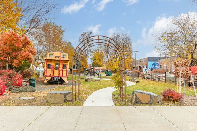 Caboose Park offers a lush green space, a playground, and a life-size train car for Dayton families.