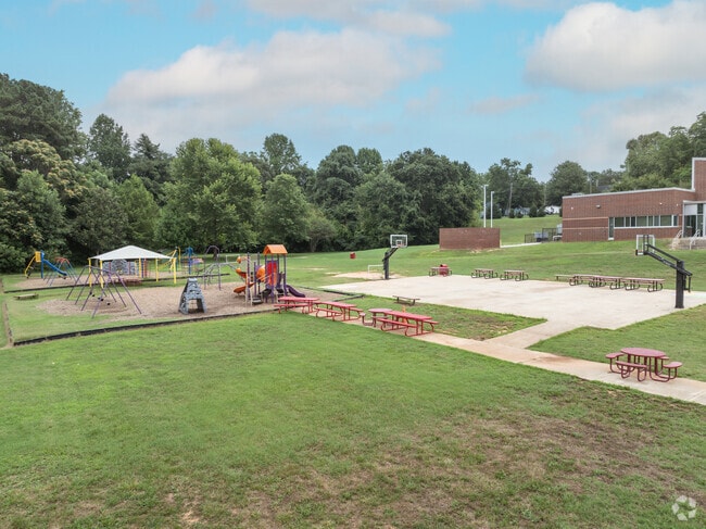 Students enjoy the playground during recess at South Newton Elementary School.