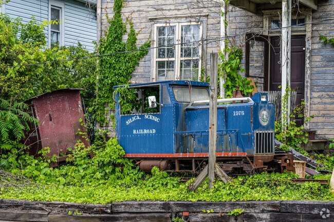 An old miniature railway sits abandoned along the National Road in Scenery Hill.