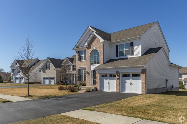 East Fishkill's New Traditional homes offer two car garages and wide driveways.