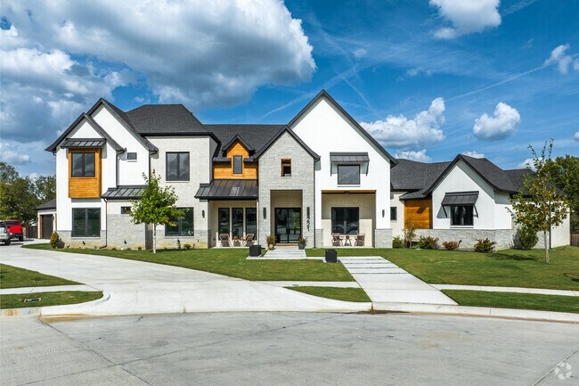 Residents of Chase Oaks in Keller, TX enjoy well-maintained homes.