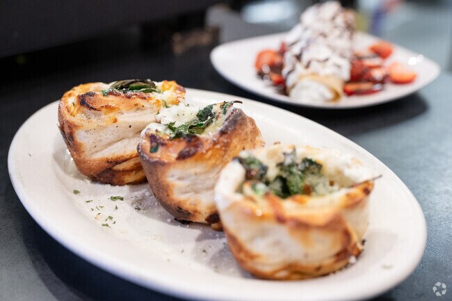 Westville residents enjoy the widely varied food selections in Taunton center.