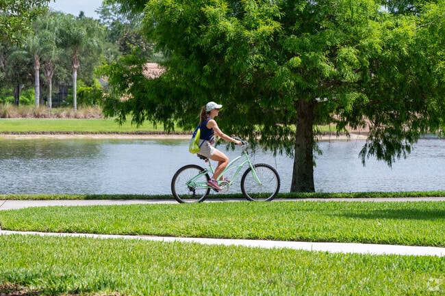 Lake Nona Central residents utilize the many paved paths throughout the neighborhood.