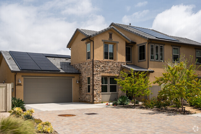 Stone accents on this Mediterranean style home in West Ridge.