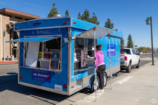 Locals line up the street to enjoy a meal while on the go in Banning.