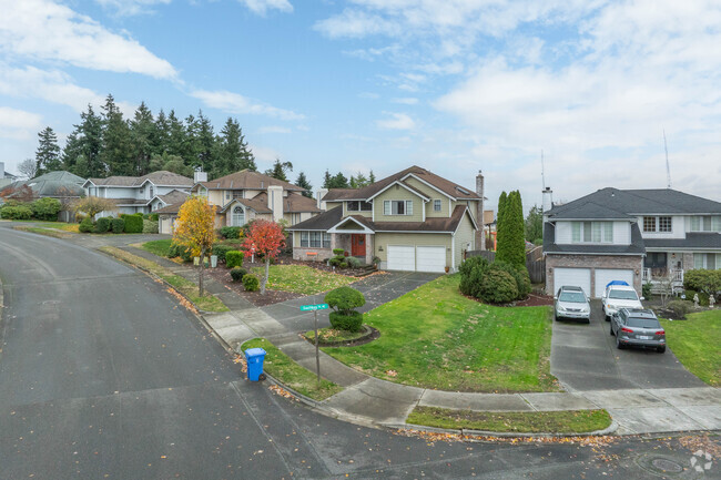 New traditionals and PNW craftsman sit on the hill in Northeast Tacoma.