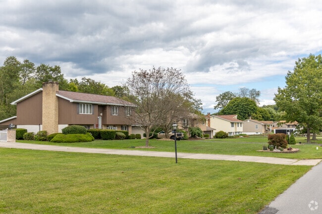 Rows of split level homes with manicured lawns are common in Foot of Ten.