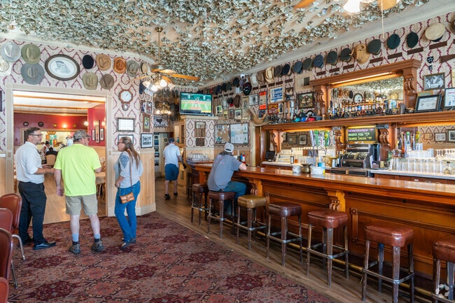 The Basque Bar features a unique ceiling decorated with dollar bills.