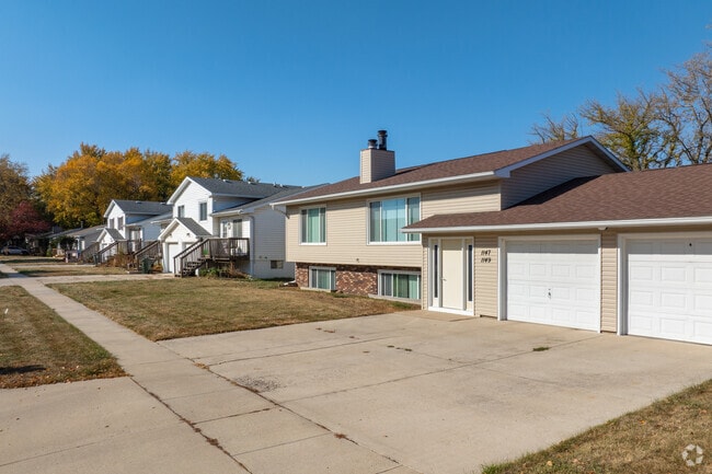 Some homes in Hurst feature multi-car garages and wide driveways.